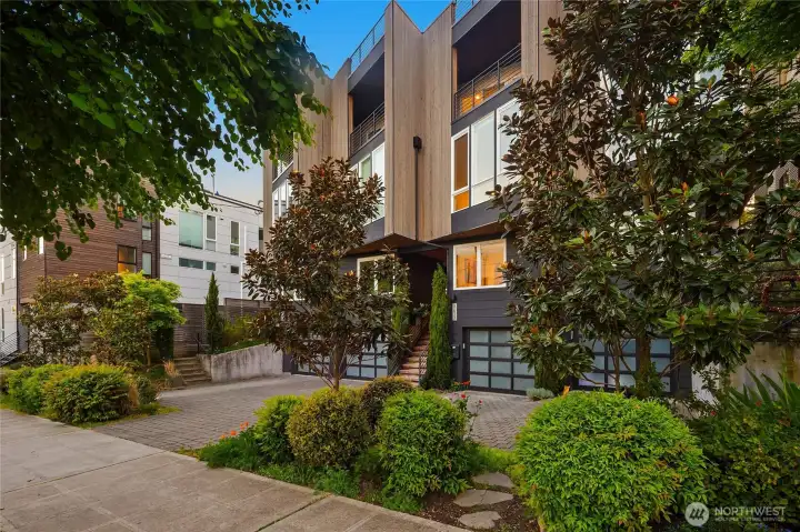 Built Green Certified townhom with garage. Stunning front garden with magnolia trees. Well designed entry offers privacy from street Built Green Certified townhom with garage. Stunning front garden with magnolia trees. Well designed entry offers privacy from street