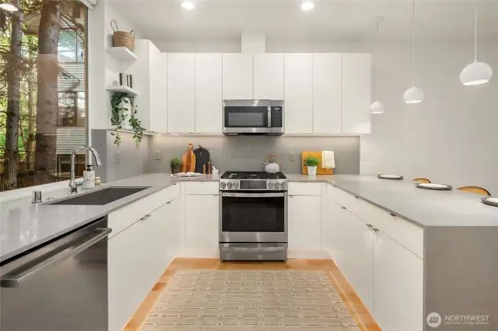 Kitchen with under cabinet and toe kick lighting. Tons of storage, GE profile Range Kitchen with under cabinet and toe kick lighting. Tons of storage, GE profile Range