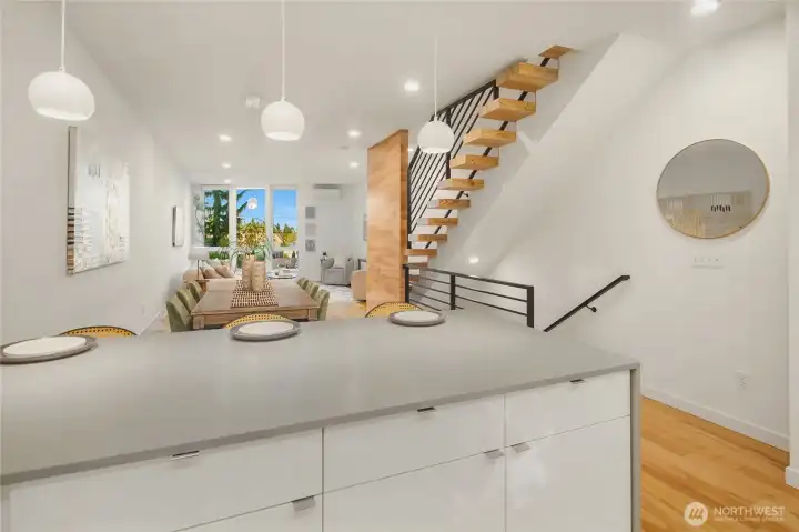 Asymmetrical architectural stairs with bespoke edge laminated timbers Asymmetrical architectural stairs with bespoke edge laminated timbers