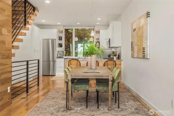 Huge dining area, staged to seat 6, but easily can fit table for 10+ Huge dining area, staged to seat 6, but easily can fit table for 10+