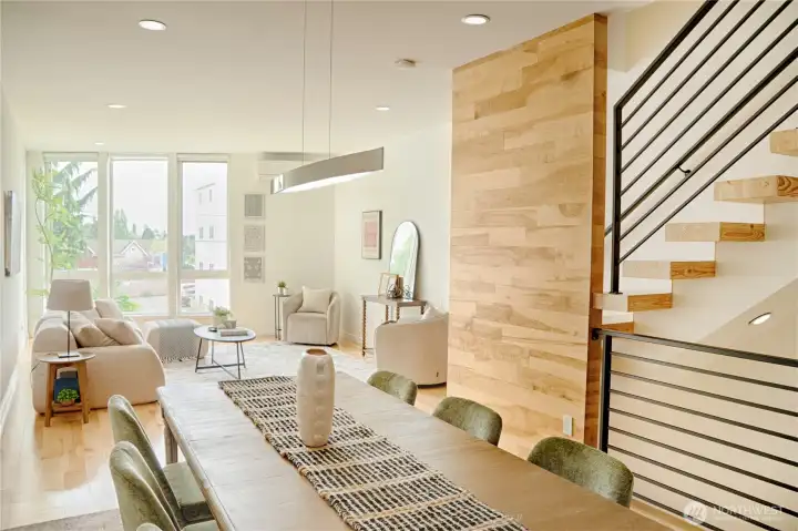 Living room angled toward Lake Union and Rainier views with floor to ceiling windows Living room angled toward Lake Union and Rainier views with floor to ceiling windows