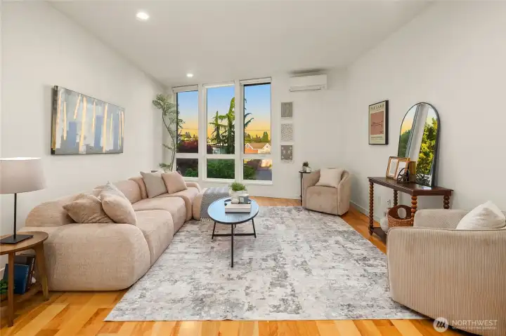 Living room angled toward Lake Union and Rainier views with floor to ceiling windows Living room angled toward Lake Union and Rainier views with floor to ceiling windows