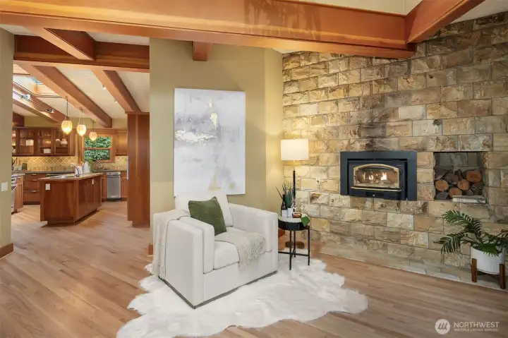 Cozy sitting area with fireplace and bookshelves