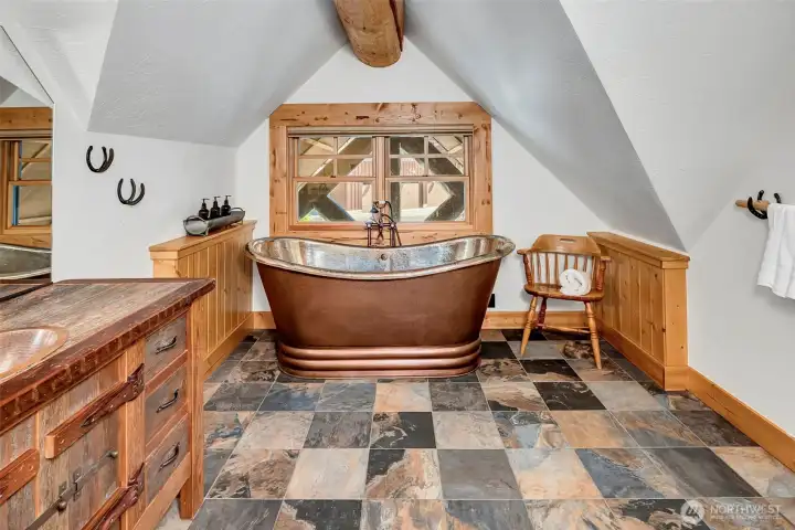 Gorgeous copper tub on upper floor, holds heat for those winter soaks