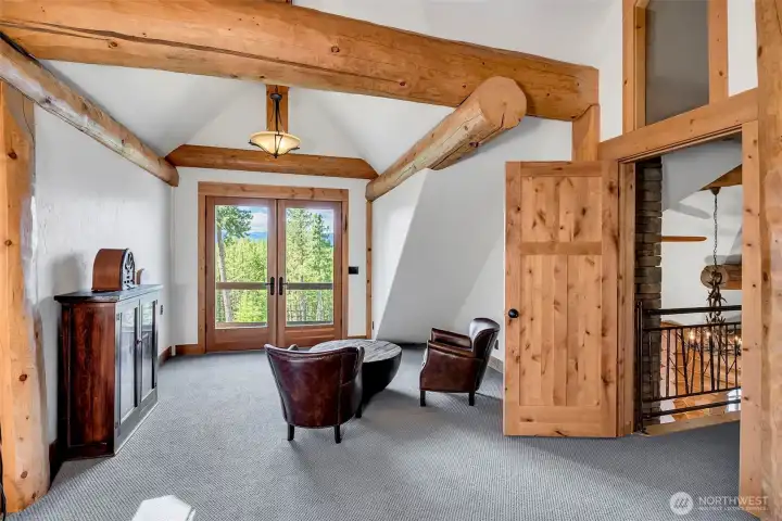 upper floor bedroom is spacious enough to fit multiple beds