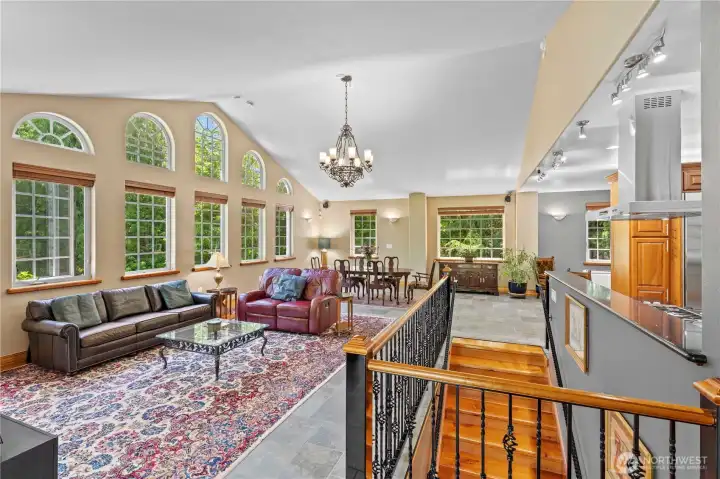 The vaulted ceilings and multitude of windows offer natural light throughout. The vaulted ceilings and multitude of windows offer natural light throughout.