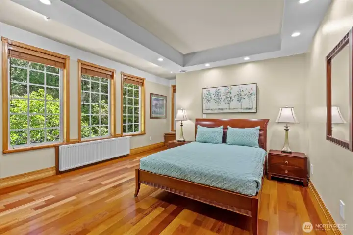 Primary bedroom features Brazilian hardwood flooring, a walk-in closet and full en suite. Primary bedroom features Brazilian hardwood flooring, a walk-in closet and full en suite.