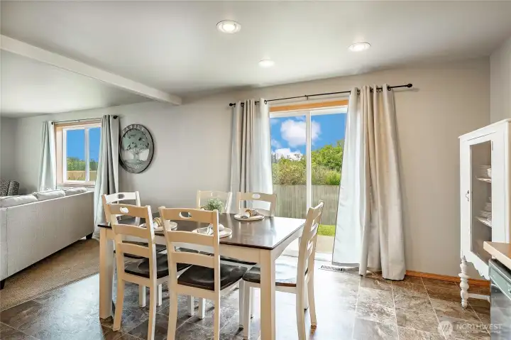 dining room w/ sliding glass door to backyard
