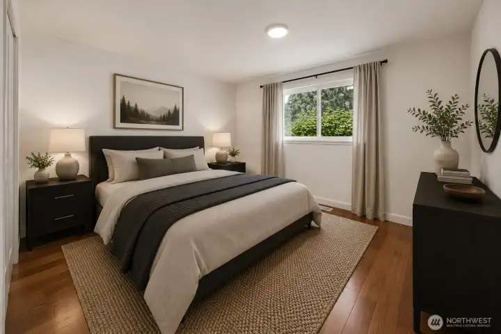 Primary bedroom in main home. Virtually staged.