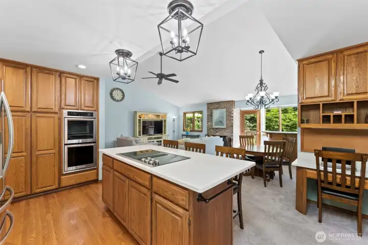 Solid hardwood floors in entry, kitchen and dining room areas.