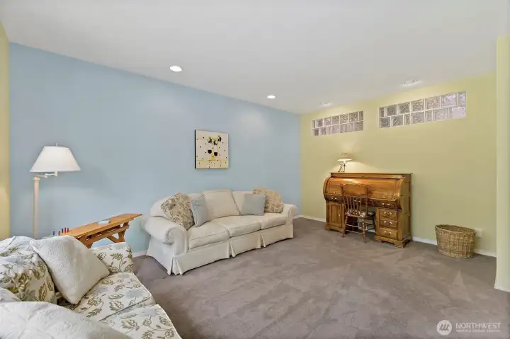 Separate large family room could be utilized as private media room, office, or workout area.