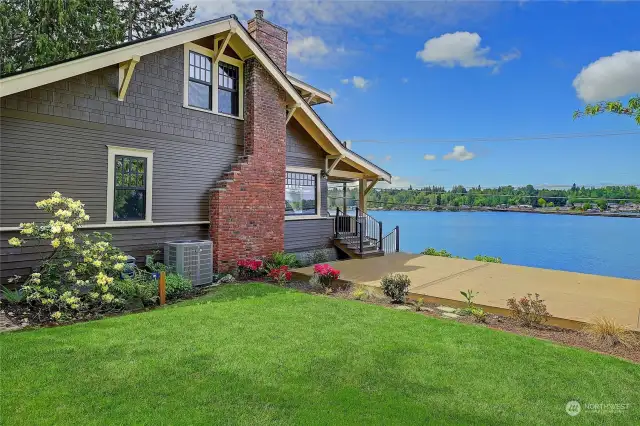 The covered outdoor space leads to a beautiful Comp deck to soak in the sun and lake views~
