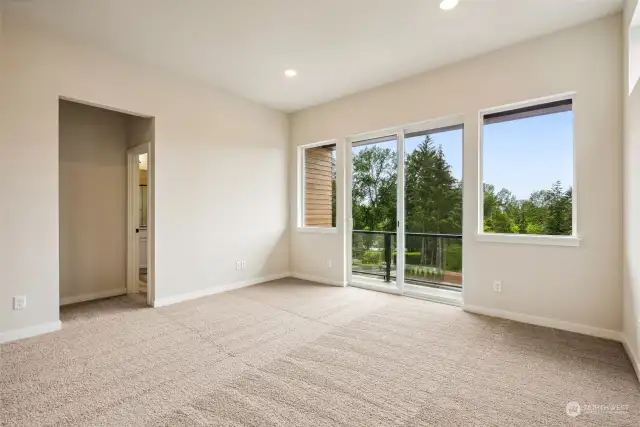 Spacious Owner Bedroom extends to covered deck