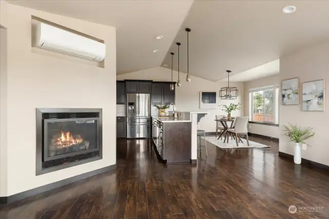 Open floor plan. Cozy up with the warmth of the fireplace or cool down with your mini-split.