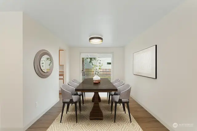 Virtual staging: dining room that opens to covered back deck -- great for overflow guests!