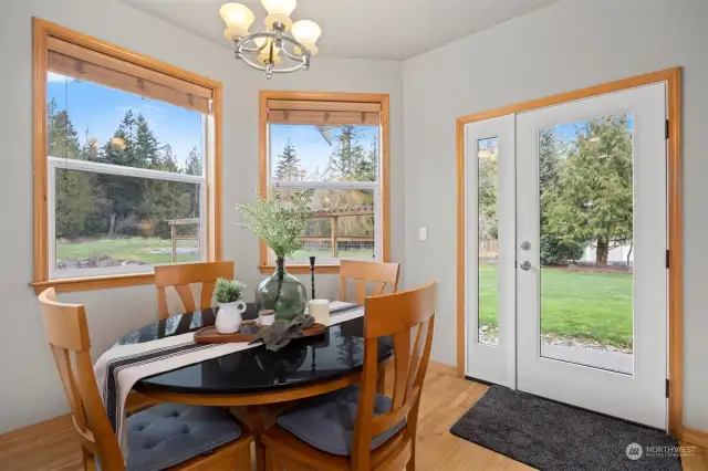 Dining nook with door to back patio.