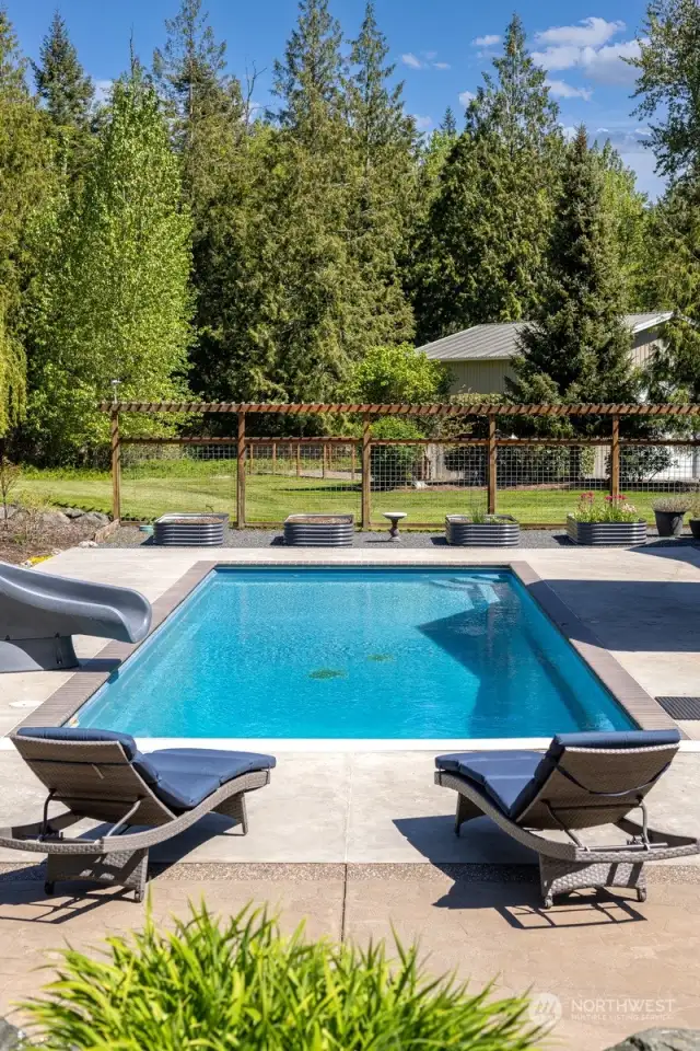 Pool is 16' x 40' with tons of patio space surrounding to lounge.