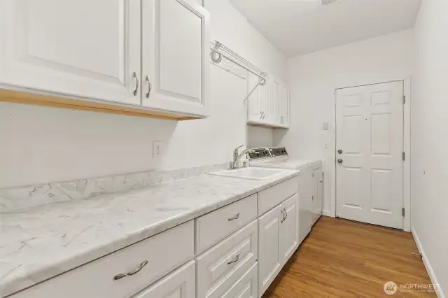 Large laundry/mud room, with direct access to garage.