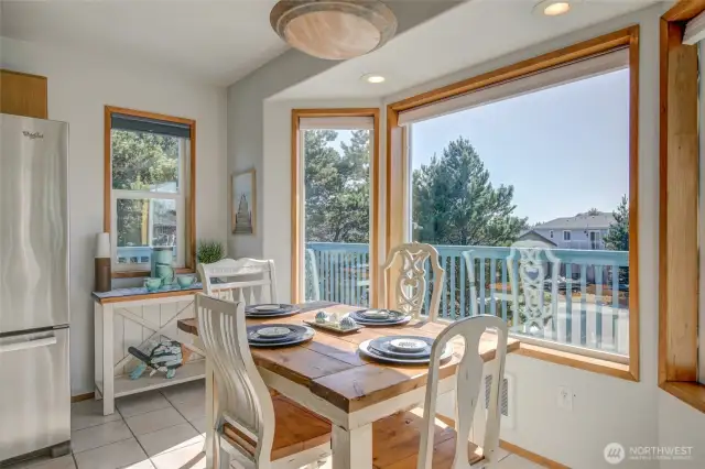 Ample dining space with peak a boo ocean view
