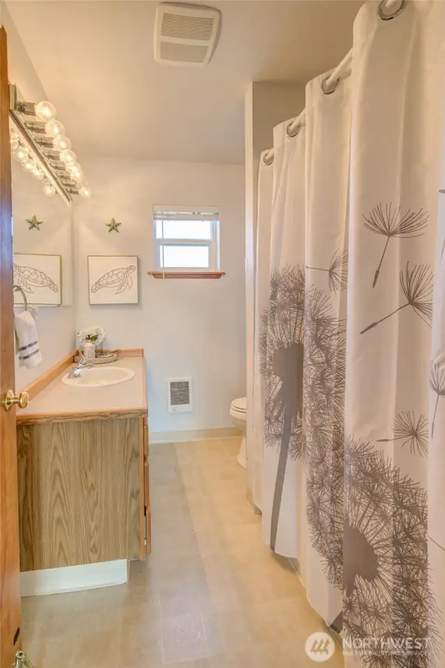 Main floor full size guest bath