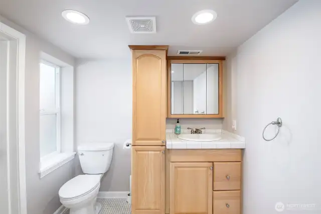 Half bath with door to rear yard
