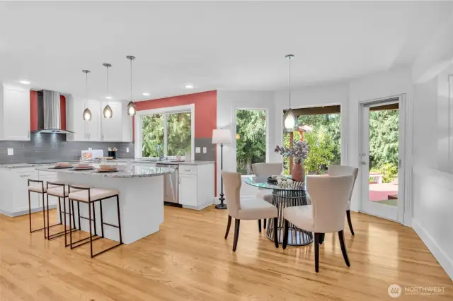 Overall view of your kitchen, eating space and access to the deck.