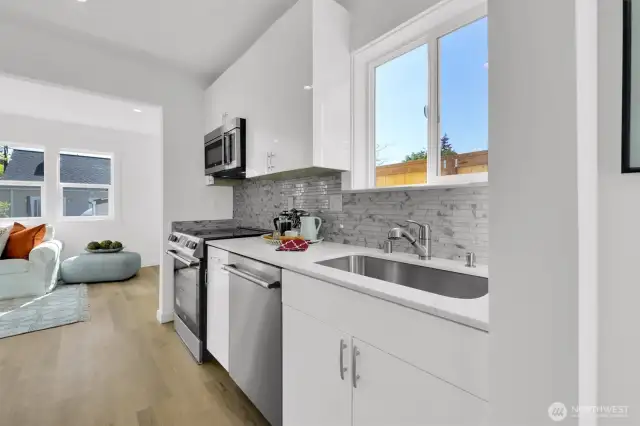 Beautiful kitchen keeps the hosts and guests entertained - 8040 19th Ave NW, Seattle, WA 98117