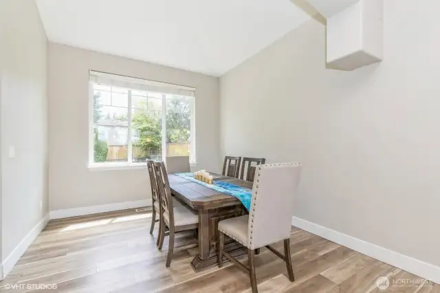 "Cozy dining area just off the kitchen, ideal for everyday meals or entertaining guests."