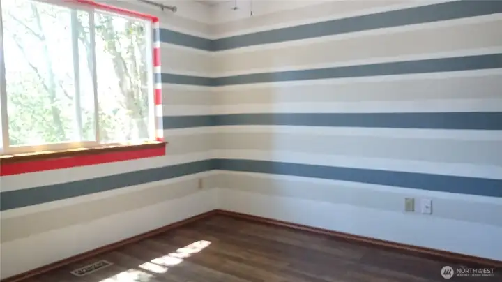 Bedroom with newer flooring-there is a ceiling fan in here too!