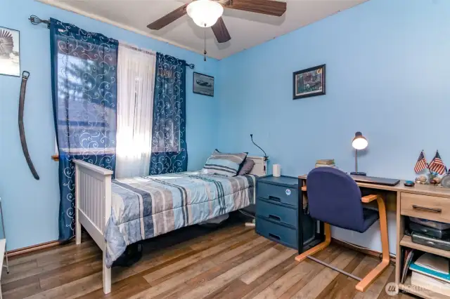 Bedroom with newer flooring