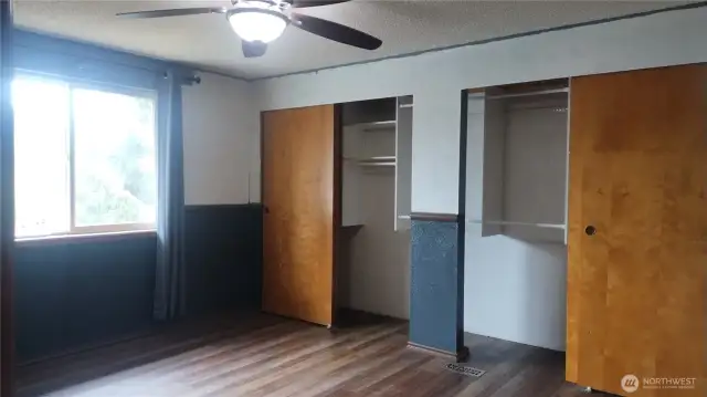 Primary bathroom with newer flooring-lots of space for a desk and dresser