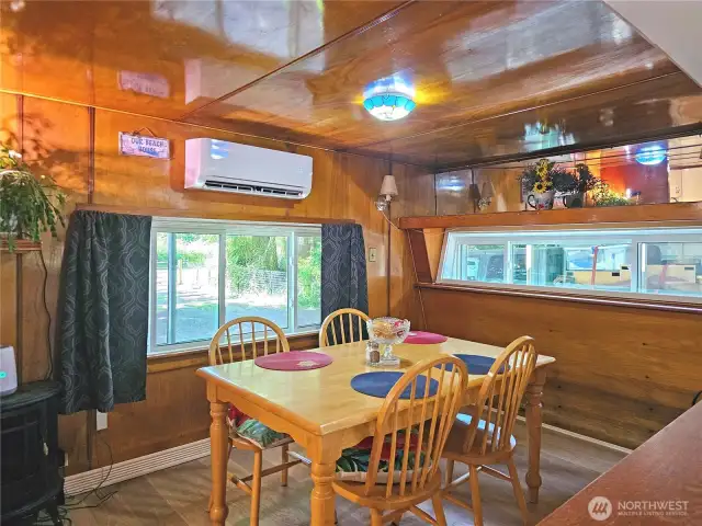 The dining room is very attractive with polished wood all around!