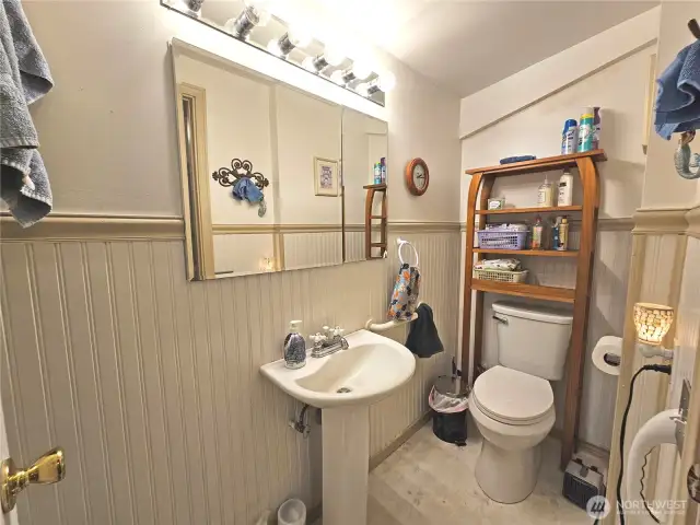 First bathroom. This is a 3/4 bath with a shower on the other side.