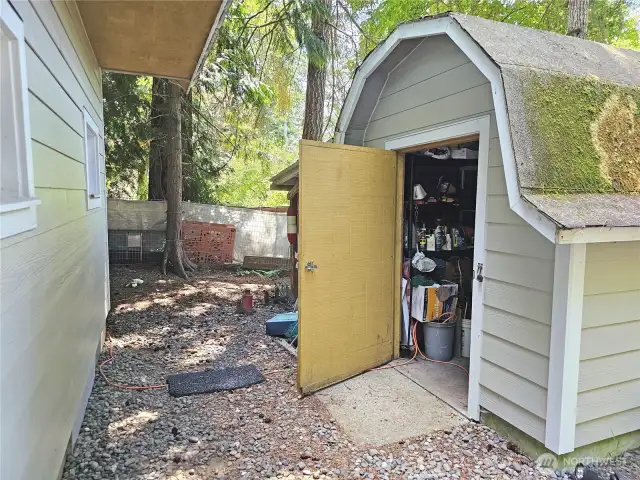 Outdoors, you have a small storage shed!