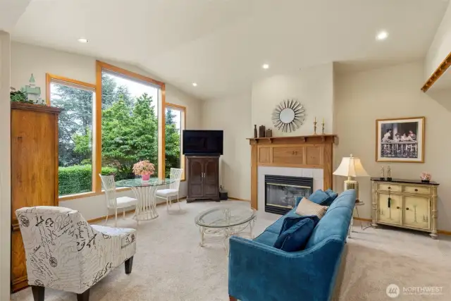 Living Room with custom mantle and vaulted ceilings