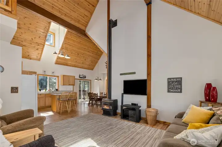 Open concept living space with soaring ceilings.