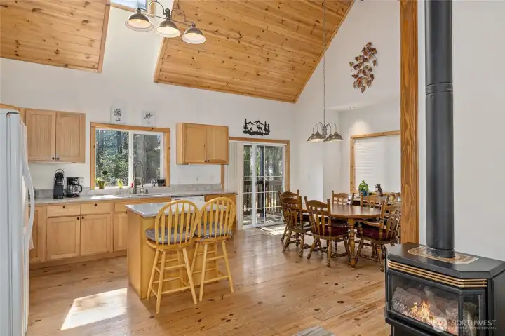 Light and bright living space with propane freestanding stove to keep you warm on the cold winter days.