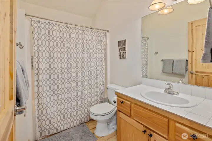 Full bath located on the upper level.