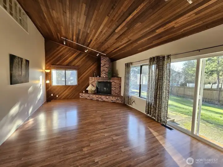 Large Family room with fireplace and vaulted ceilings