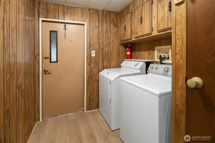 Carport entry/utility room. Wahser/dryer stay.