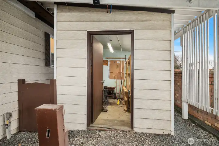 Storage shed in finished, insulated and has power.