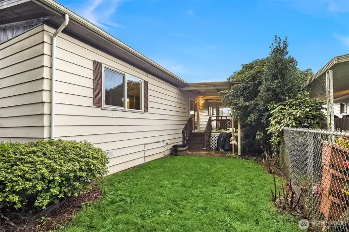 Small back/front yard is fully fenced.