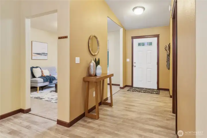 Entry to formal dining/office/sitting room on the left, closet to right of frame