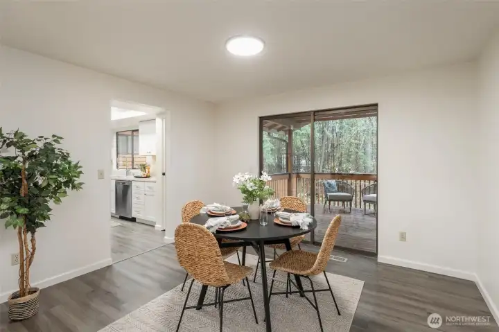 A look in the dining room that leads to the covered back deck.