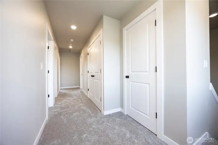 Linen closet and washer and dryer closet upstairs