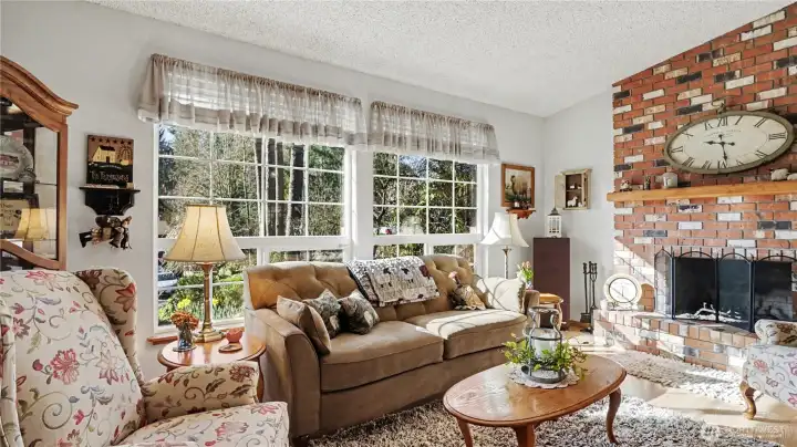 Large windows fill the space with beautiful natural light.