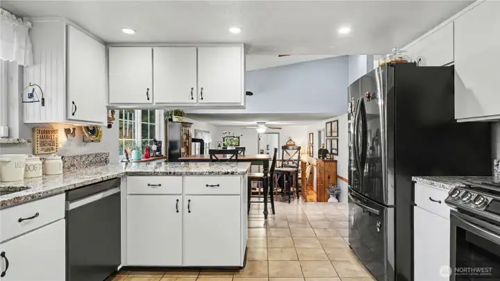 Kitchen also features stainless steel appliances and plenty of storage.
