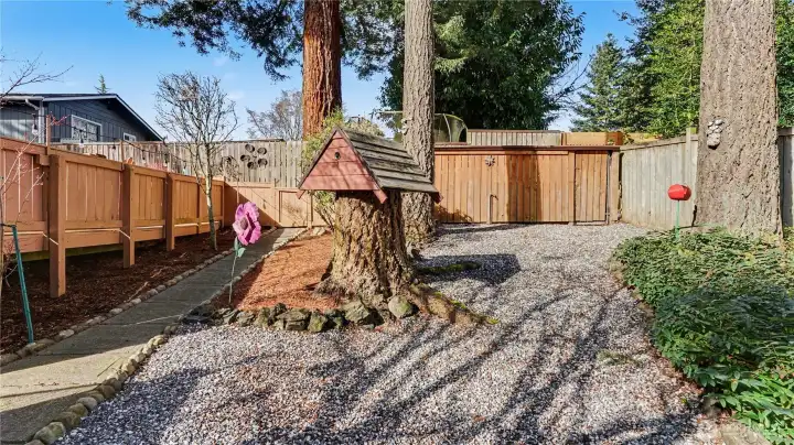 Whimsy yard decorations placed thoughtfully around the property.