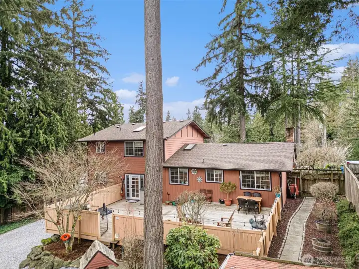 Tucked away among mature trees, offering a sense of privacy and tranquility.