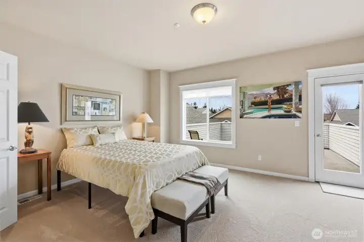 Second floor bedroom opens to roof deck